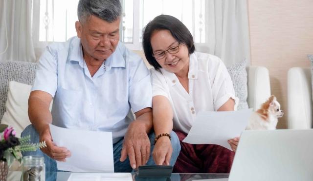 Couple reviewing financial institutions